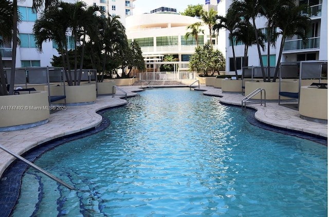 pool with a patio area