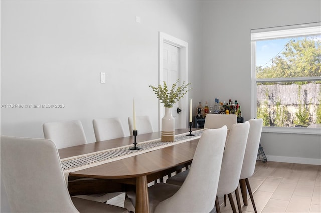 dining space with baseboards