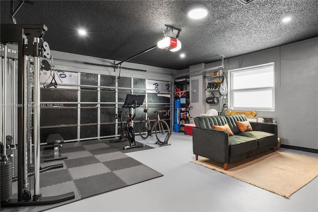 garage with water heater, electric panel, and a garage door opener