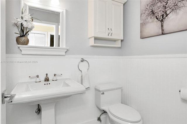 bathroom with a sink and toilet