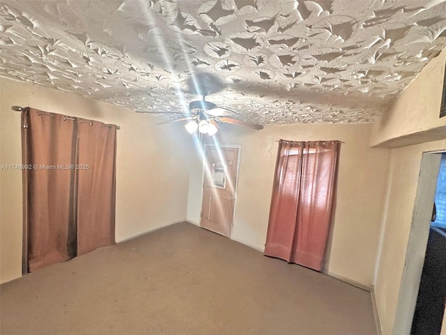 empty room featuring ceiling fan