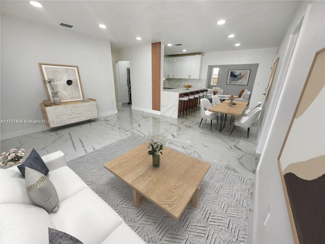 living room featuring visible vents, recessed lighting, marble finish floor, and baseboards