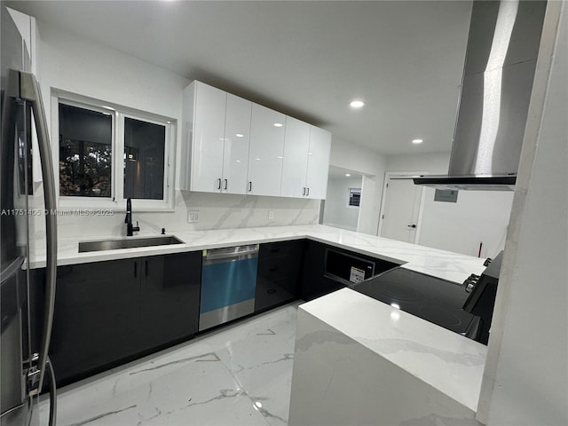 kitchen featuring island exhaust hood, stainless steel appliances, white cabinetry, a sink, and modern cabinets