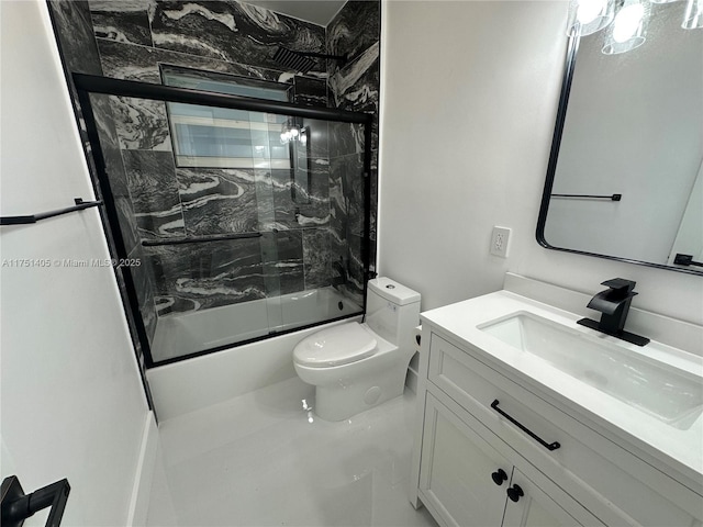 bathroom with toilet, bath / shower combo with glass door, and vanity