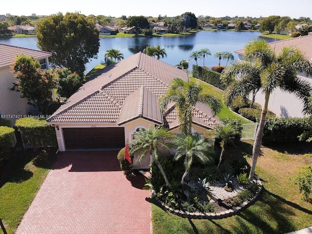 drone / aerial view with a water view