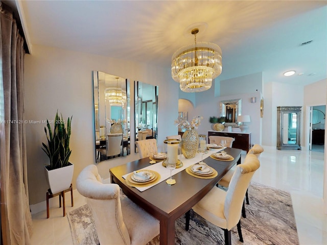 dining space featuring a chandelier, visible vents, and tile patterned floors