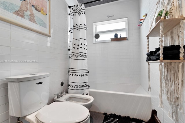 full bath with toilet, shower / tub combo, a bidet, and tile walls