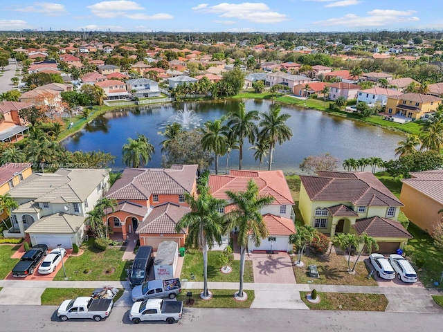 aerial view featuring a water view and a residential view