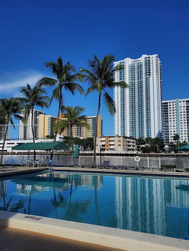 community pool featuring a view of city