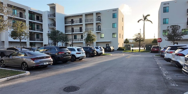 4640 NW 84th Ave Unit 13, Doral, FL 33166 - view of apartment building / complex featuring uncovered parking