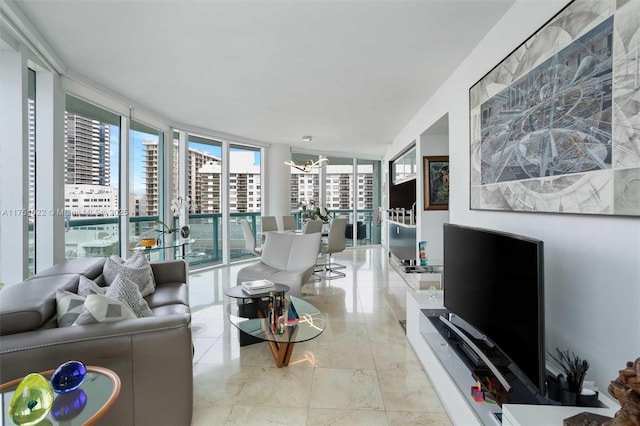 living area featuring a view of city and a wall of windows