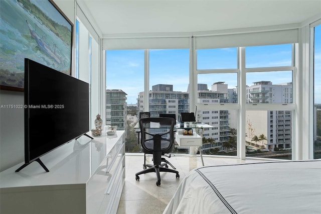 bedroom with floor to ceiling windows