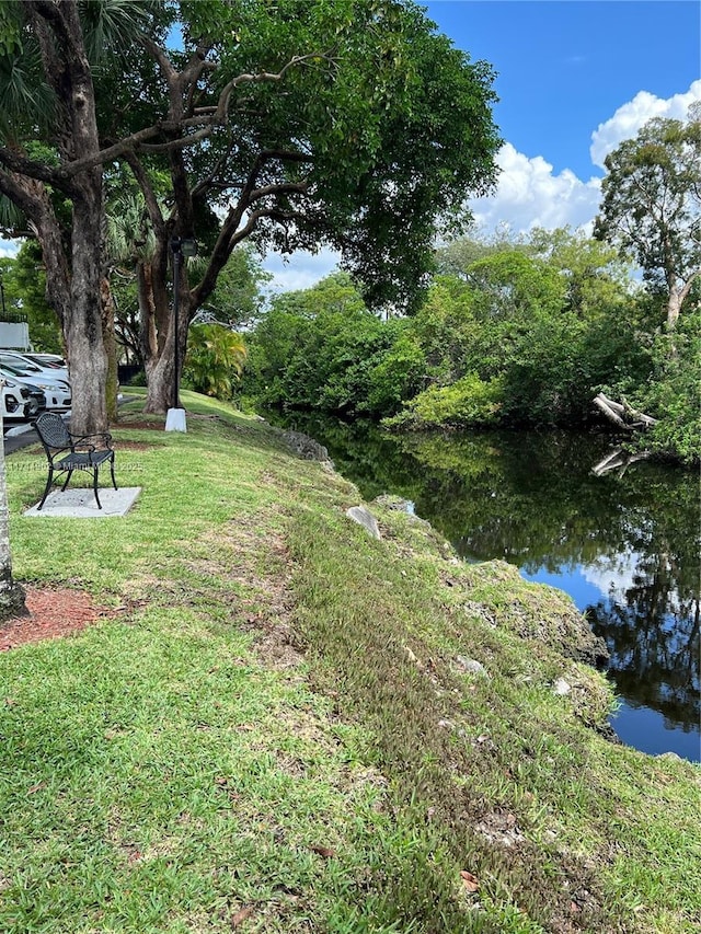 view of yard featuring a water view