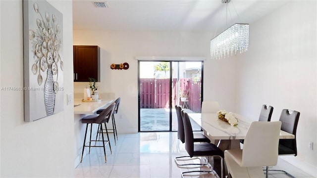 dining space with visible vents