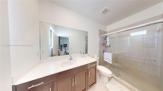 ensuite bathroom featuring visible vents, toilet, ensuite bath, vanity, and a shower stall