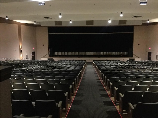 view of carpeted cinema