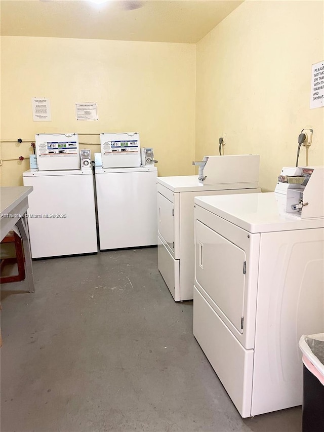 shared laundry area with independent washer and dryer