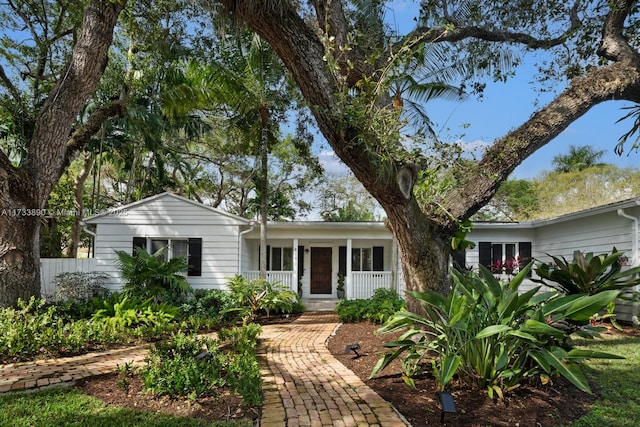 ranch-style house with covered porch