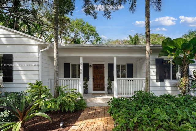 property entrance with a porch