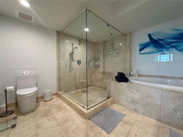 full bath featuring a stall shower, baseboards, visible vents, toilet, and a bath