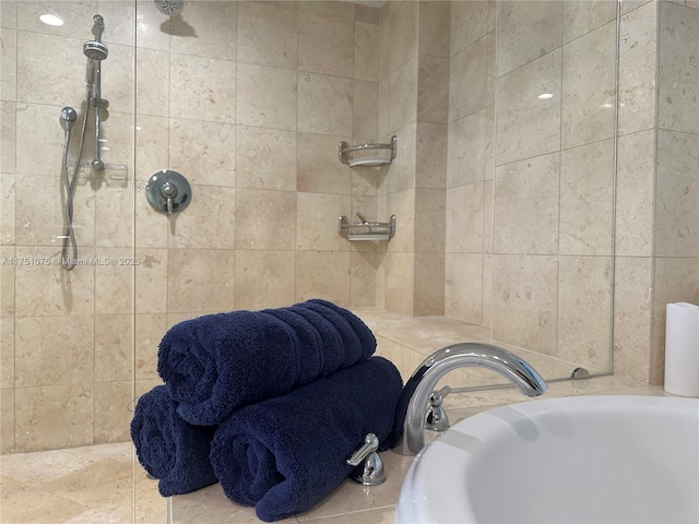 full bath featuring a sink and a bathing tub