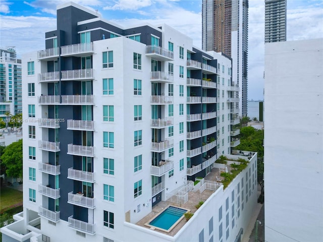 view of building exterior featuring a view of city