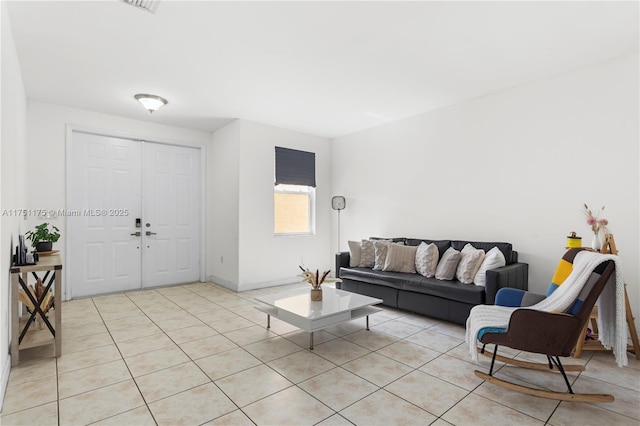 living room featuring light tile patterned floors