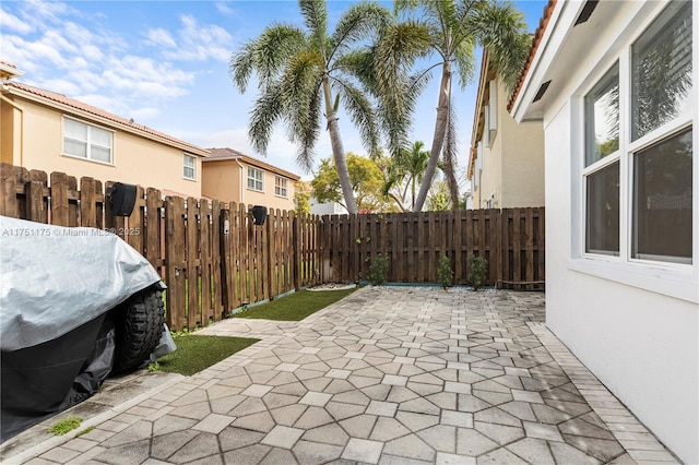 view of patio with a fenced backyard