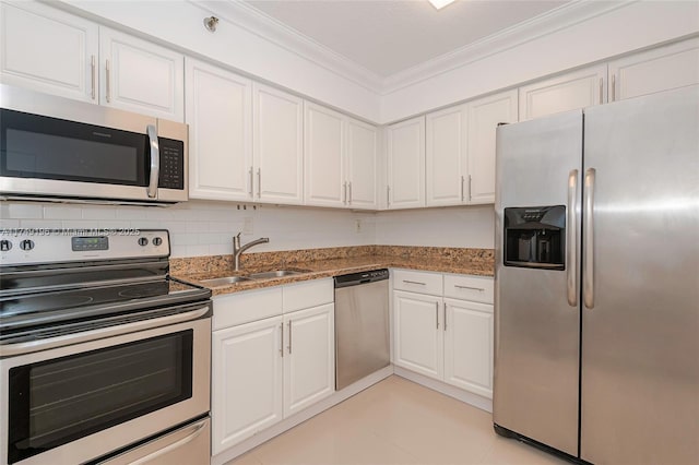 kitchen with stainless steel appliances, white cabinets, crown molding, and a sink