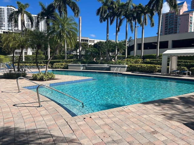 pool with a patio area