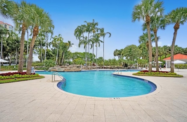 pool with a patio area