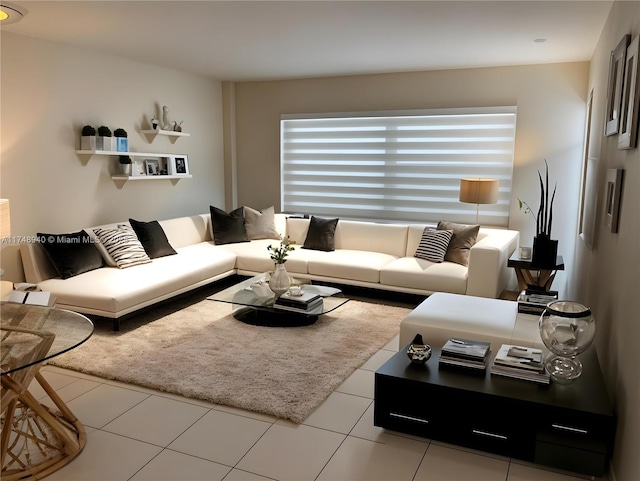 living area with tile patterned flooring