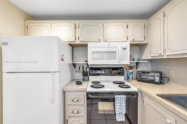 kitchen with light countertops, open shelves, white appliances, and a toaster