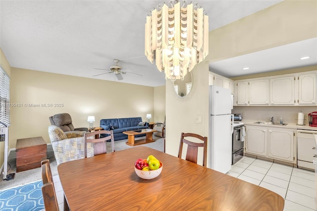 dining room featuring recessed lighting, light tile patterned floors, and ceiling fan