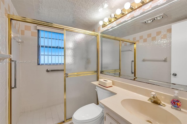 full bath with toilet, a stall shower, and vanity