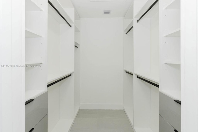 walk in closet with visible vents
