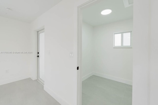 empty room with baseboards