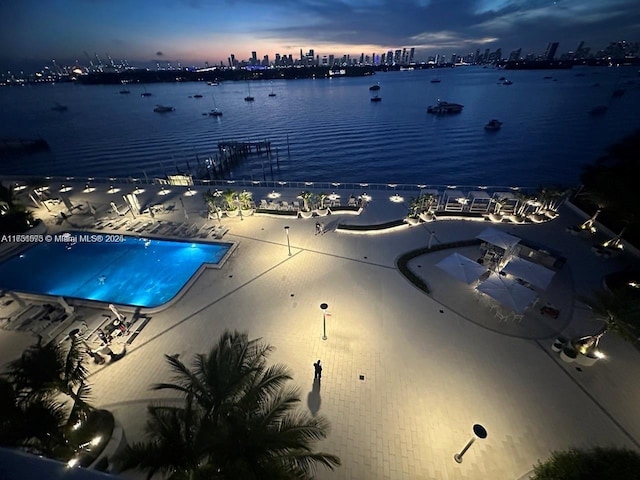 exterior space with a view of city and a water view