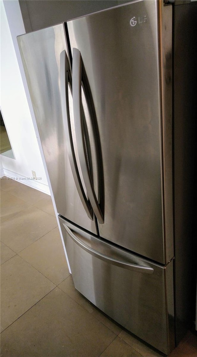 room details featuring freestanding refrigerator