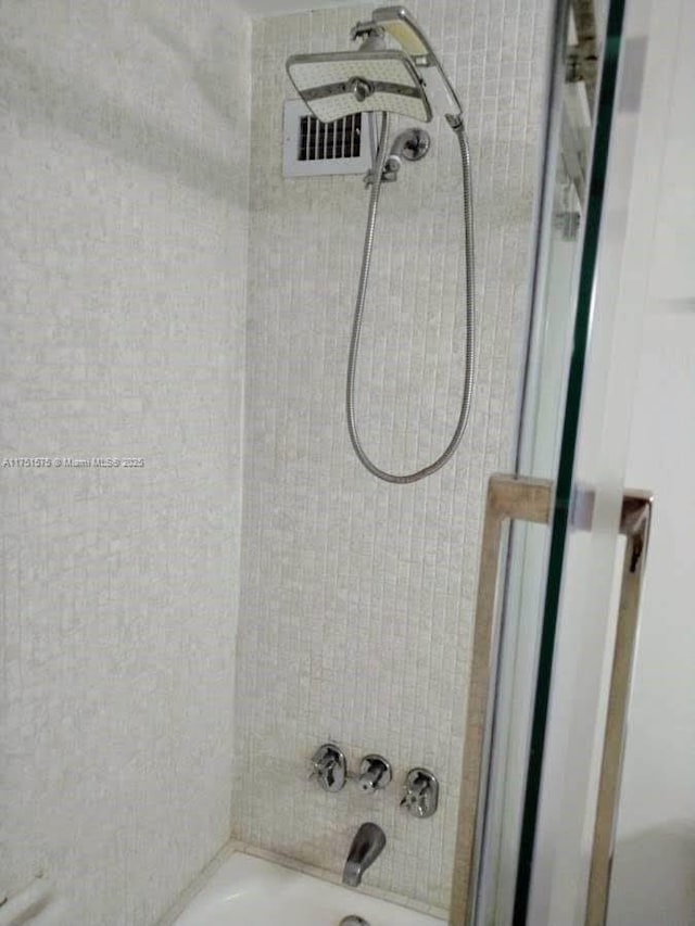 full bath featuring shower / bath combination