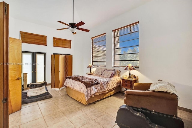 bedroom with ceiling fan and light tile patterned flooring