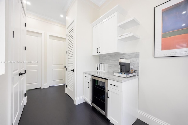 kitchen with open shelves, wine cooler, white cabinetry, and decorative backsplash