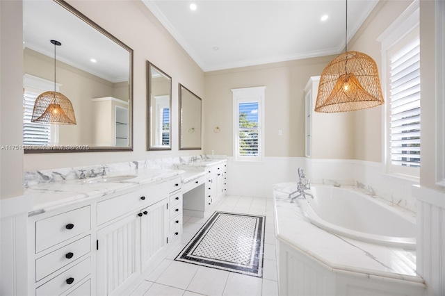 full bathroom featuring double vanity, a sink, tile patterned flooring, crown molding, and a bath