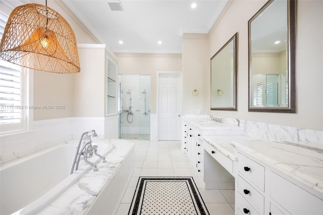 bathroom with a garden tub, a sink, visible vents, ornamental molding, and double vanity