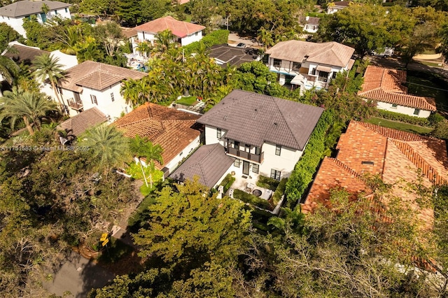 birds eye view of property with a residential view