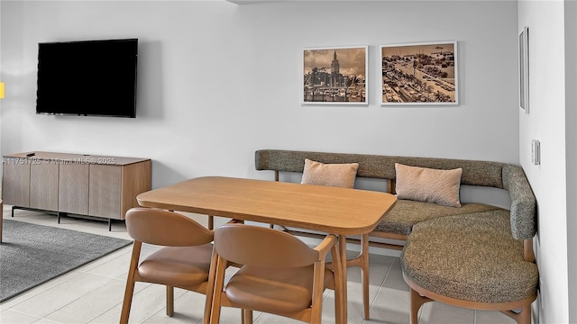 dining room with light tile patterned floors