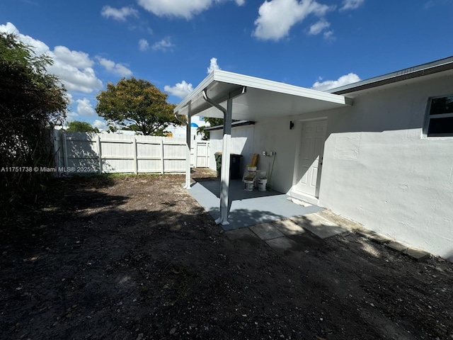 view of yard featuring a patio and fence