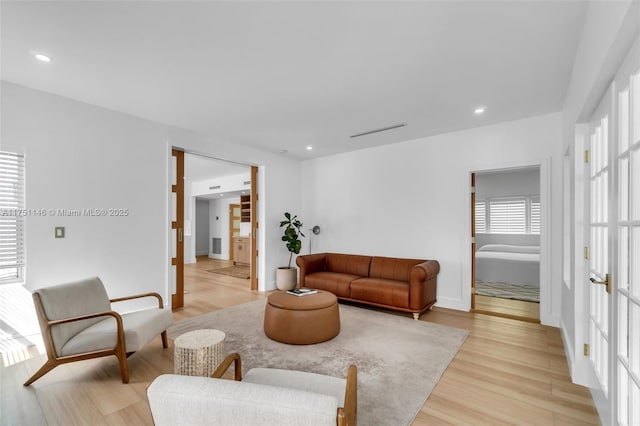 2043 SW 7th St, Miami, FL 33135 - living area with recessed lighting, baseboards, light wood finished floors, and visible vents