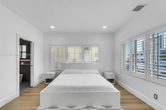 2043 SW 7th St, Miami, FL 33135 - bedroom featuring recessed lighting, baseboards, visible vents, and light wood-type flooring