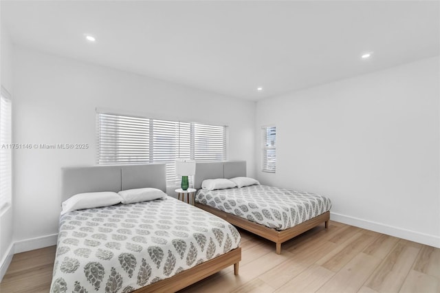 2043 SW 7th St, Miami, FL 33135 - bedroom featuring light wood-style floors, recessed lighting, and baseboards